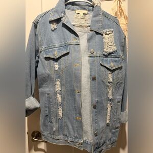 Distressed jean jacket